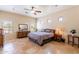 Serene main bedroom featuring a ceiling fan and lots of natural light at 1438 E Mesquite St, Gilbert, AZ 85296