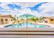 Backyard in-ground swimming pool with umbrella at 1438 E Mesquite St, Gilbert, AZ 85296