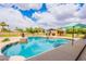 Backyard in-ground swimming pool with desert landscaping at 1438 E Mesquite St, Gilbert, AZ 85296