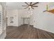 Spacious open-concept living area featuring high ceilings and contemporary flooring at 14458 W Zuni Trl, Surprise, AZ 85374