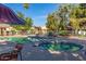 Community pool with a spa and comfortable seating; perfect for relaxation and entertainment at 14458 W Zuni Trl, Surprise, AZ 85374
