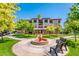 Attractive building surrounded by lush landscaping, showcasing a tranquil courtyard with a fountain at 14950 W Mountain View Blvd # 7309, Surprise, AZ 85374