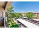 Scenic overhead view of lush community grounds and covered parking from a private patio at 14950 W Mountain View Blvd # 7309, Surprise, AZ 85374