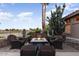 Cozy outdoor seating area with a fire pit, perfect for enjoying cool evenings at 15109 W Waterford Dr, Surprise, AZ 85374