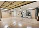 Spacious garage with custom cabinets along the walls to allow for maximum organization and storage at 15109 W Waterford Dr, Surprise, AZ 85374