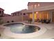 Private backyard features a sparkling pool, covered patio, and serene landscaping for relaxing outdoor living at 15229 S 18Th Dr, Phoenix, AZ 85045