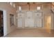Spacious living room featuring a built-in entertainment center and high ceilings at 15229 S 18Th Dr, Phoenix, AZ 85045
