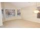 Bright living room with large windows offering natural light and neighborhood views at 15229 S 18Th Dr, Phoenix, AZ 85045