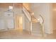 Bright and airy staircase with carpeted steps and white railings at 15229 S 18Th Dr, Phoenix, AZ 85045