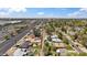 Aerial view of neighborhood featuring tree-lined streets and single-Gathering homes with convenient access to retail at 1529 W Rovey Ave, Phoenix, AZ 85015