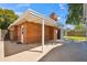 Brick exterior backyard featuring a covered patio and easy access at 1529 W Rovey Ave, Phoenix, AZ 85015