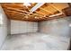Spacious garage with concrete block walls and ample storage at 1529 W Rovey Ave, Phoenix, AZ 85015