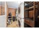 Laundry room area featuring stacked washer and dryer and ample storage options at 1529 W Rovey Ave, Phoenix, AZ 85015