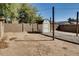 The backyard includes a convenient storage shed, gravel accents and low-maintenance landscaping at 16188 W Boca Raton Rd, Surprise, AZ 85379