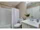 Cozy bathroom with shower-tub combination and single sink at 16188 W Boca Raton Rd, Surprise, AZ 85379