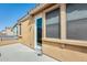 Rooftop balcony featuring neutral stucco, a door, and an adjacent view of the neighborhood at 1633 W Lacewood Pl, Phoenix, AZ 85045