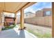 Covered patio area provides a shaded outdoor space for relaxation and entertaining at 1633 W Lacewood Pl, Phoenix, AZ 85045