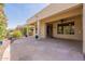 Spacious covered patio offering seamless indoor-outdoor living, perfect for relaxation and entertaining at 20627 N Lemon Drop Dr, Maricopa, AZ 85138
