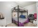 Bedroom featuring a modern bunk bed, carpeted floors, and neutral wall tones at 215 N Power Rd # 340, Mesa, AZ 85205
