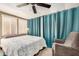 Cozy bedroom with neutral tones, natural light, and comfortable furnishings at 215 N Power Rd # 340, Mesa, AZ 85205