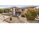 Cozy home with covered parking and beautiful landscaping with decorative accents at 215 N Power Rd # 340, Mesa, AZ 85205