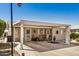 Charming home with covered parking and a welcoming front entrance at 215 N Power Rd # 340, Mesa, AZ 85205