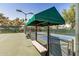Pickleball courts featuring shaded benches for relaxation between games at 215 N Power Rd # 340, Mesa, AZ 85205