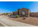Beautiful single-story home featuring desert landscaping and a well-maintained yard at 23805 W Romley Ave, Buckeye, AZ 85326