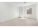 A flex room with white walls, hard surface floors and an exterior view at 24152 N 172Nd Ave, Surprise, AZ 85387