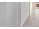 Bright hallway features neutral paint, tiled floors, and doors leading to other rooms at 24152 N 172Nd Ave, Surprise, AZ 85387