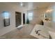 Spacious bathroom with a large tub, and sinks, a walk-in shower, and walk-in closet at 24228 S 211Th St, Queen Creek, AZ 85142