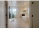 Bright bathroom with a large tub and and sinks at 24228 S 211Th St, Queen Creek, AZ 85142