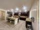 Spacious kitchen with dark wood cabinets, granite countertops, and stainless steel appliances at 24228 S 211Th St, Queen Creek, AZ 85142