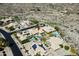 Desert home with pool, patio and pristine desert landscaping, showcasing its outdoor amenities at 2449 E Desert Flower Ln, Phoenix, AZ 85048