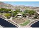 Scenic aerial view of a neighborhood park featuring mature landscaping, walking paths and shaded seating areas at 2449 E Desert Flower Ln, Phoenix, AZ 85048