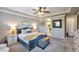 Bright bedroom featuring an ensuite bathroom with a tiled floor at 2468 W Dapple Gray Ct, San Tan Valley, AZ 85144