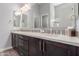 Elegant bathroom with a double sink vanity, quartz countertop, and modern fixtures at 26699 N 104Th Way, Scottsdale, AZ 85262