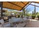 Community grilling and picnic area with shaded seating and stainless steel grill at 26699 N 104Th Way, Scottsdale, AZ 85262