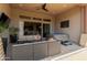 Cozy covered patio featuring a hot tub, comfortable seating, and stylish decor at 26699 N 104Th Way, Scottsdale, AZ 85262