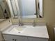 Bathroom featuring light countertops, and a modern mirror at 2834 E Juanita Ave, Mesa, AZ 85204