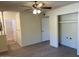 Spacious bedroom featuring hardwood floors and a ceiling fan at 2834 E Juanita Ave, Mesa, AZ 85204