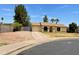 Single-story home with a front-facing two car garage and desert landscaping at 2834 E Juanita Ave, Mesa, AZ 85204