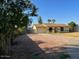 Front yard with desert landscaping and a two-car garage at 2834 E Juanita Ave, Mesa, AZ 85204