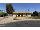 Home with a two car garage, mature shade trees and desert landscaping at 2834 E Juanita Ave, Mesa, AZ 85204