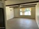 Bright living room with laminate flooring and a large window for natural light at 2834 E Juanita Ave, Mesa, AZ 85204