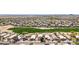 A wide aerial view of the neighborhood and community near a golf course at 29051 N Shannon Dr, San Tan Valley, AZ 85143