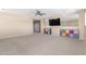 Spacious bonus room with neutral walls, carpet, and a ceiling fan, providing a relaxing vibe at 29051 N Shannon Dr, San Tan Valley, AZ 85143