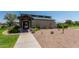 Community clubhouse entrance with landscape in a Gathering-friendly neighborhood at 29051 N Shannon Dr, San Tan Valley, AZ 85143