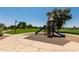 Community playground with slide, climbing structures and view of lake at 29051 N Shannon Dr, San Tan Valley, AZ 85143