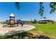 Playground and park area with a gazebo and covered seating enhance the community at 29051 N Shannon Dr, San Tan Valley, AZ 85143
